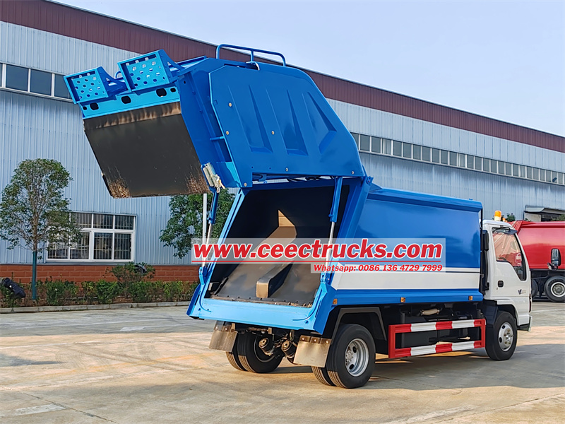 Isuzu NKR trash compactor truck